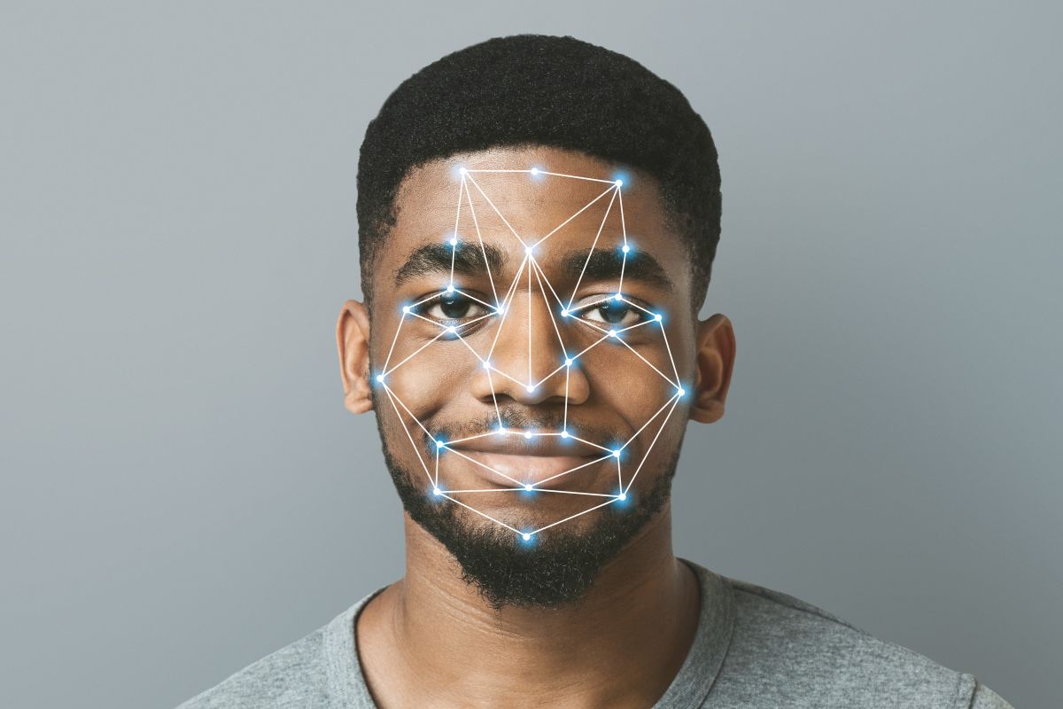 man with biometric grid over face